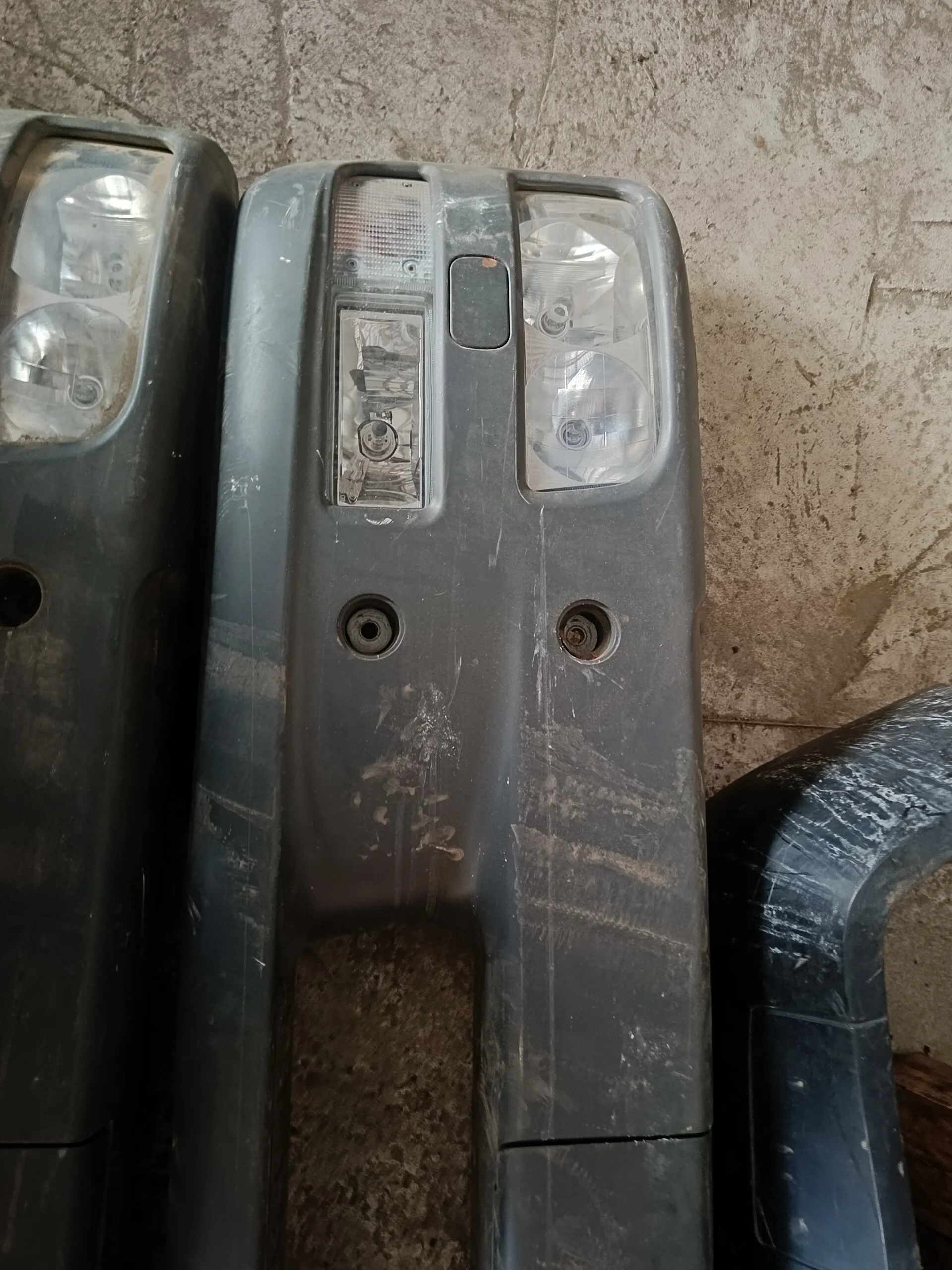 передний бампер с фарами и поворотниками MAN TGL